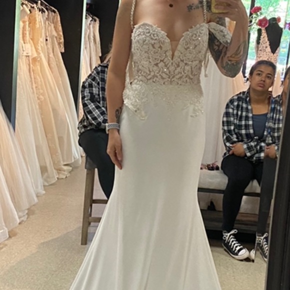 BRAND NEW - Beautiful, multiple ways to wear this wedding dress! - Picture 8 of 9